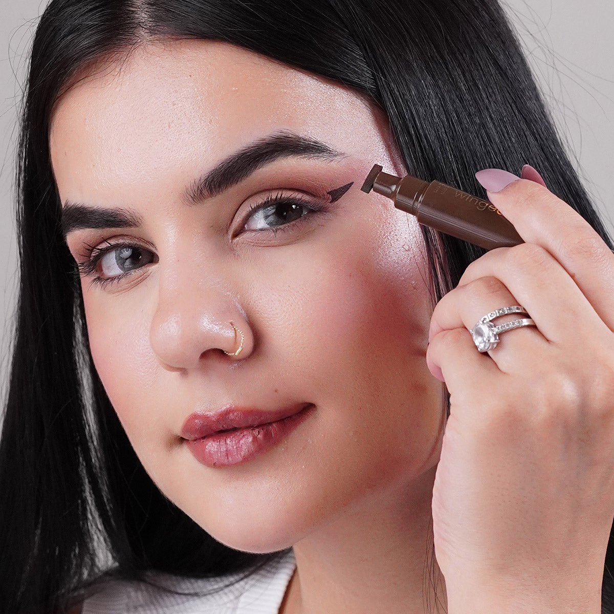 winged eyeliner stamp